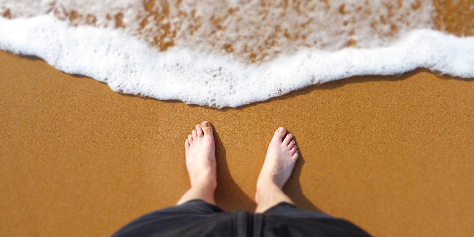 Füße am Strand