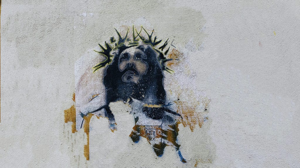 Portrait von Jesus an einer Mauer