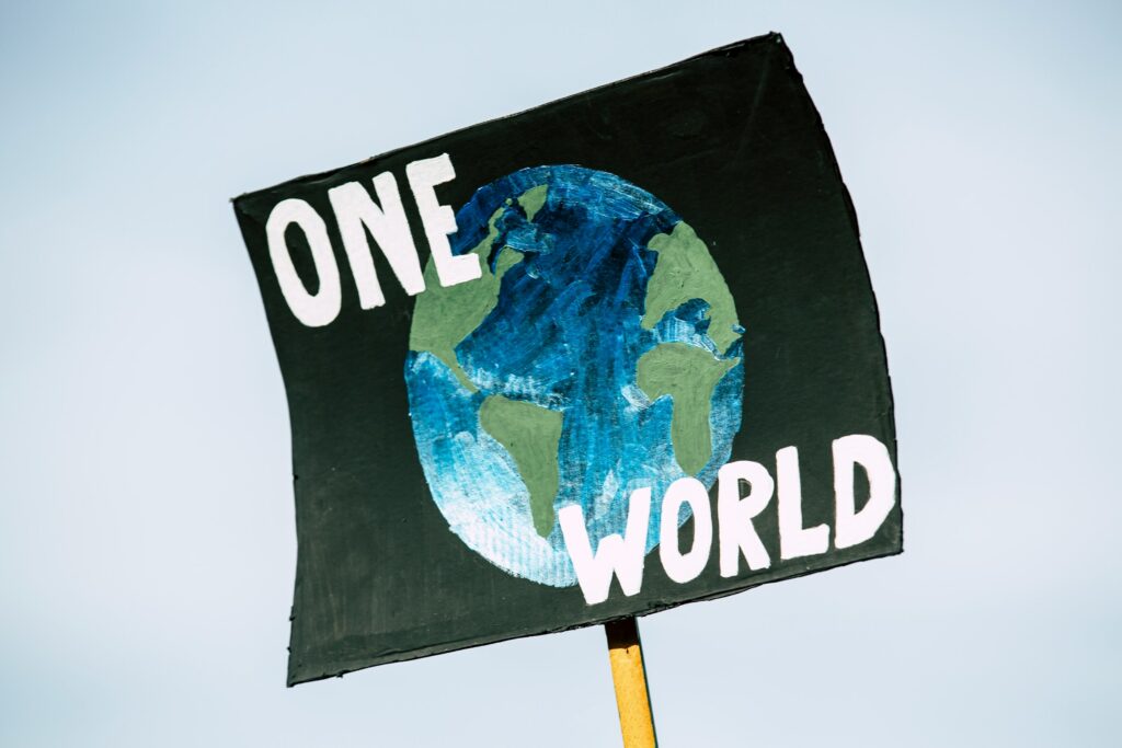 Schild one World