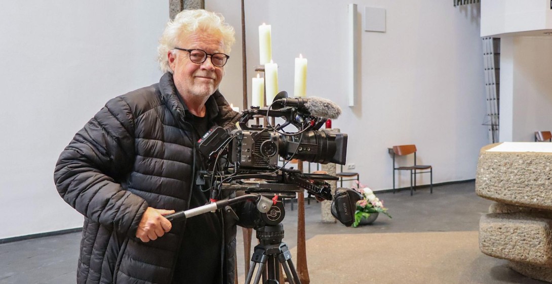 Andreas Half hinter einer Profikamera